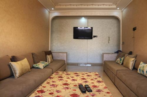 Кът за сядане в Luxury Apartment II Nador Jadid Free Parking & Wifi