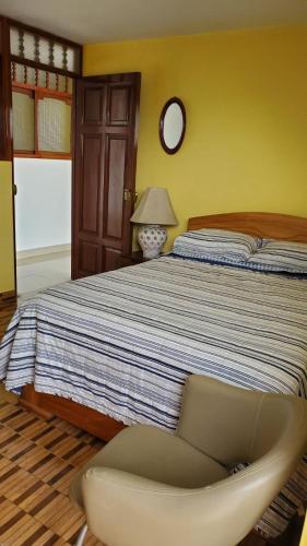 Una cama o camas en una habitación de Guiltor host