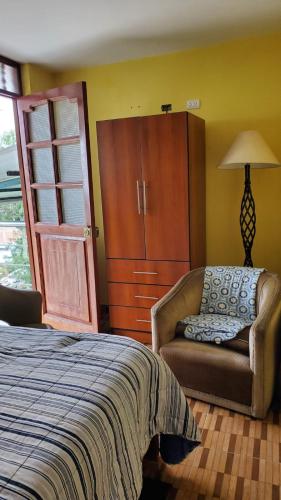 Una cama o camas en una habitación de Guiltor host
