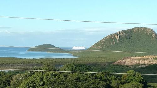 a cruise ship in a body of water at Zeus Estate Guesthouse in Grays Hill