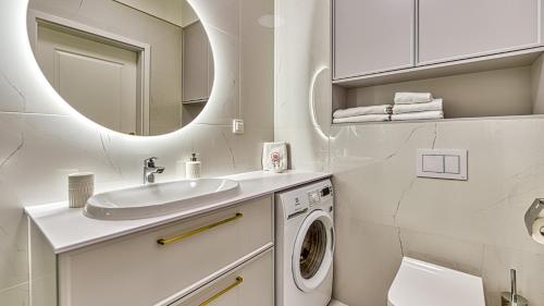 Koupelna v ubytování Rezydencja Niechorze Apartament SŁONECZNY 231 - 5D Apartamenty