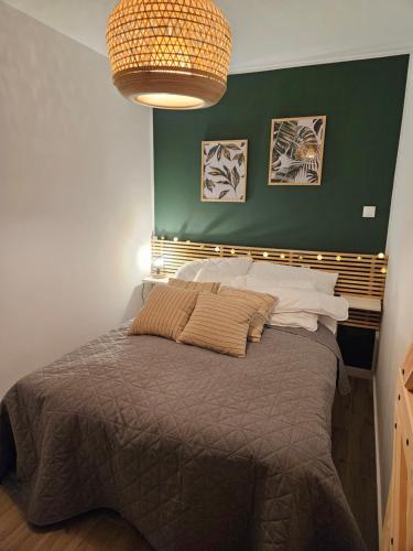 Ένα ή περισσότερα κρεβάτια σε δωμάτιο στο Apartament Górski Czas