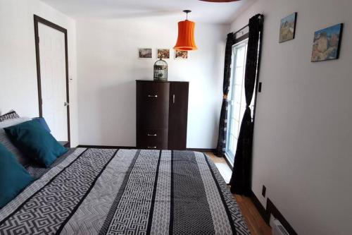 Katil atau katil-katil dalam bilik di Chalet Bella Vista - Lake access - SPA - 4 bdrms