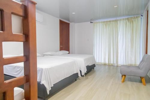 מיטה או מיטות בחדר ב-Casa Campo Victoria