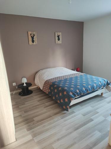 Ліжко або ліжка в номері Aux portes de Chambord