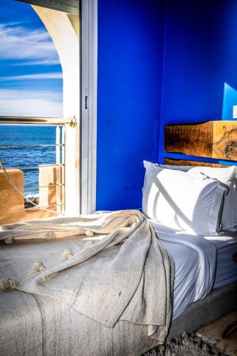 Katil atau katil-katil dalam bilik di La Skala - Apartment with great sea view