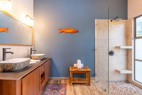 a bathroom with a sink and a shower at Villa Roca Ocean to Mountain Views - by Pura Villas in Ojochal