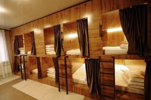 Postel nebo postele na pokoji v ubytování Cozy Hostel