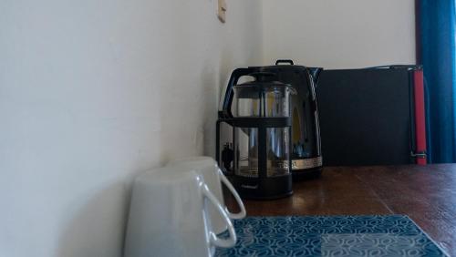 a coffee maker sitting on top of a counter at Posada Arigalan in Mazunte