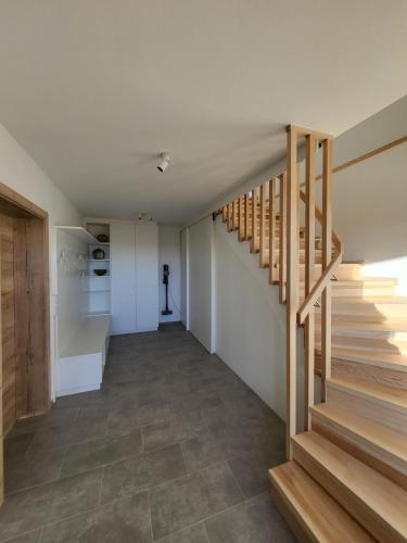 a hallway with stairs in a house at Haus am Hochwechsel in Breitenbrunn