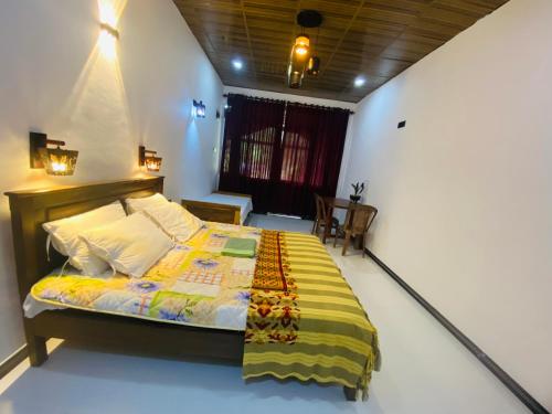 Cama o camas de una habitación en Rathnapriya Oasis