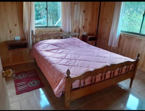 Postel nebo postele na pokoji v ubytování Cabaña El Puerto