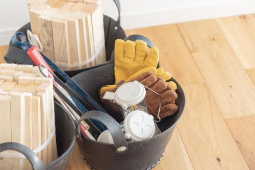 a container with a glove and tools on a table at 【南房テラス】180度パノラマオーシャンビュー絶景を楽しむリゾート別荘の家 in Kanaya