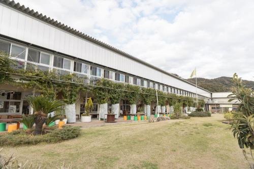 an external view of the building at 【南房テラス】180度パノラマオーシャンビュー絶景を楽しむリゾート別荘の家 in Kanaya