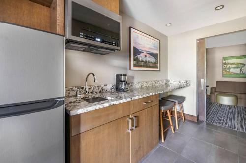 a kitchen with a sink and a counter top at Hilton Vacation Club Tahoe Seasons Lake Tahoe in South Lake Tahoe