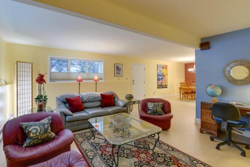 a living room with a couch and chairs and a table at Anchorage Vacation Rental Near Coastal Trail! in Anchorage