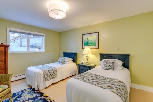 a bedroom with two beds and a window at Anchorage Vacation Rental Near Coastal Trail! in Anchorage