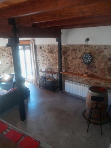 a living room with a couch and a table at Casa Buscareta in Montán