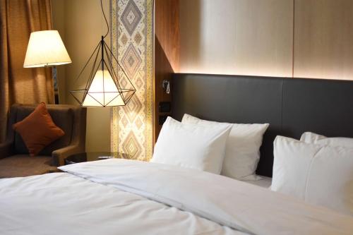 Ein Bett oder Betten in einem Zimmer der Unterkunft Radisson BLU Hotel Yerevan