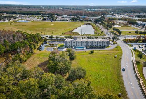 an aerial view of a building and a road at SPOT X Hotel Tampa Bay by Red Collection in Wesley Chapel