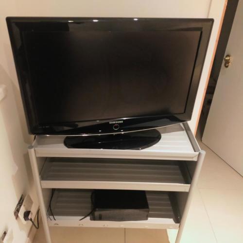 En tv och/eller ett underhållningssystem på VINOX PROPERTY