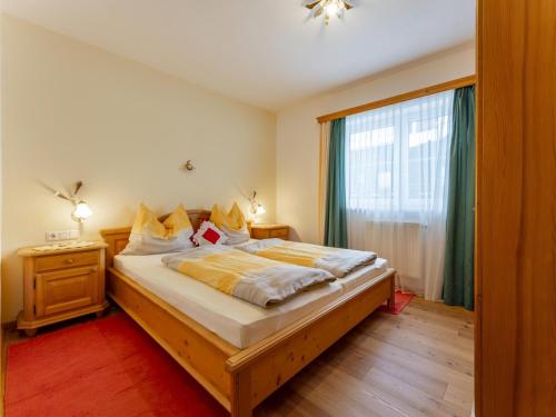Кровать или кровати в номере Sunnseitn