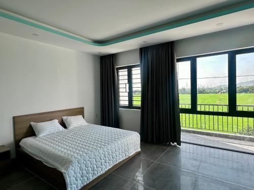 Postel nebo postele na pokoji v ubytování Ruby Motel Bà Rịa
