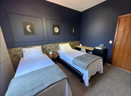 Un pat sau paturi într-o cameră la Kim Casa BH