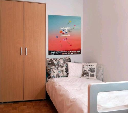 Postel nebo postele na pokoji v ubytování Cosy single room with balcony in top location