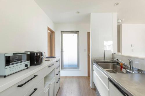 Dapur atau dapur kecil di Relastay Kamata
