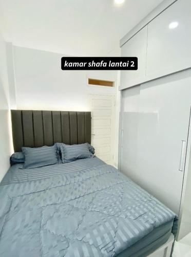 Ένα ή περισσότερα κρεβάτια σε δωμάτιο στο Villa Shafa Marwa