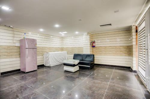 Ruang duduk di Hotel O Anshun Residency Near Mk Cinemas Rohini