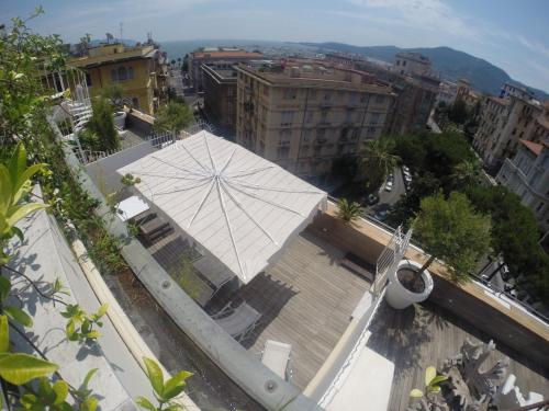 an aerial view of a city with a large umbrella at Casa Palmira in La Spezia