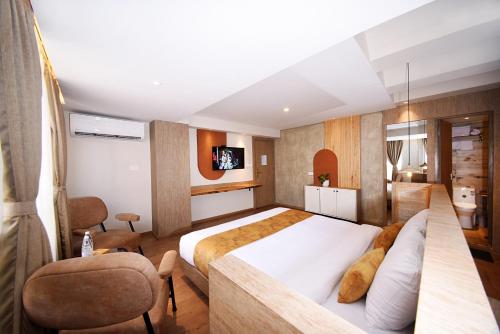 Postel nebo postele na pokoji v ubytování Daali Hotel & Apartment