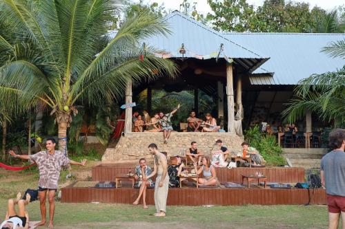 a group of people playing a game of frisbee at Atlas Valley in Pai