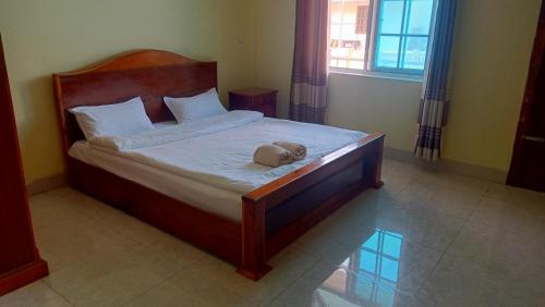 Llit o llits en una habitació de Phongpadith
