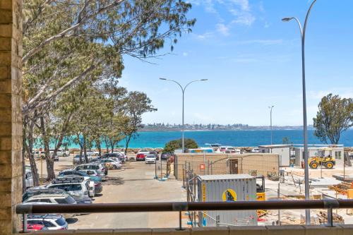 a view of a parking lot with cars parked at Nautica Residences Hillarys in Perth