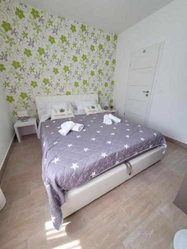 Ένα ή περισσότερα κρεβάτια σε δωμάτιο στο Apartment Toth - Rtina Benići