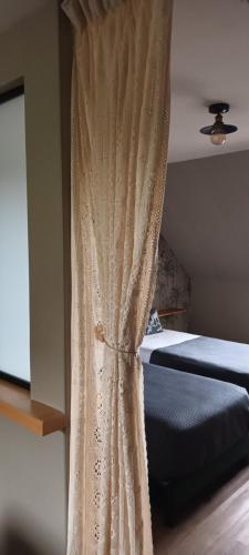 Postel nebo postele na pokoji v ubytování Maison 1949