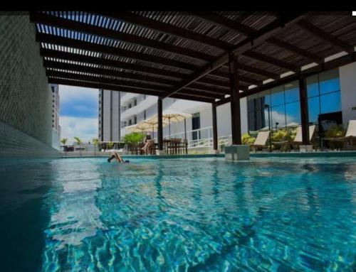 Bazén v ubytování Mundial Hotel & Flat SSA nebo v jeho okolí