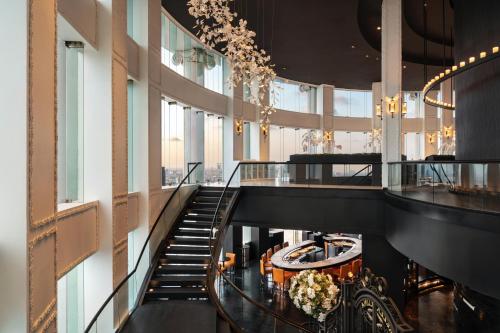 a view of a staircase in a building at Tower Club at lebua in Bangkok