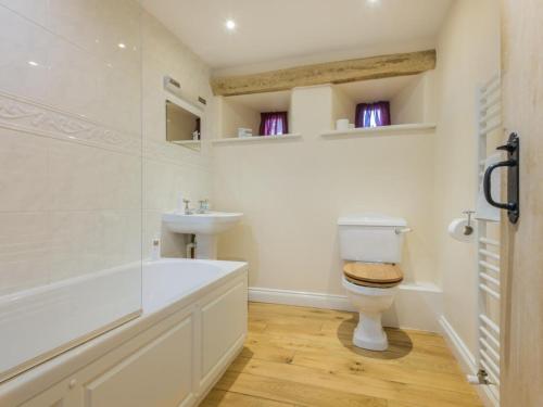 a bathroom with a toilet and a sink at 2 Bed in Patterdale SZ470 in Patterdale