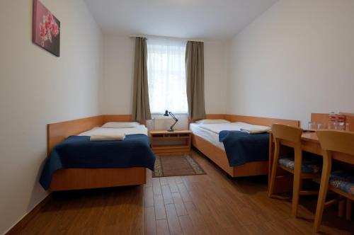 Postel nebo postele na pokoji v ubytování Hotel Miramar