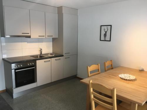 Η κουζίνα ή μικρή κουζίνα στο Apartments Carmena