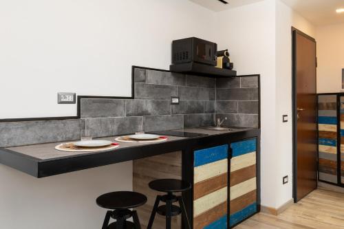 Una cocina o cocineta en OlbiaLoft