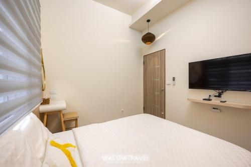 Ein Bett oder Betten in einem Zimmer der Unterkunft Light of the Dawn