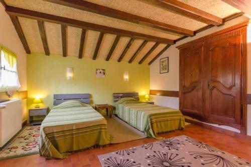 Postel nebo postele na pokoji v ubytování Le saint hilaire