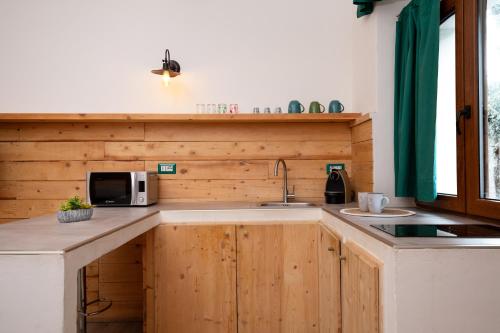 Una cocina o cocineta en OlbiaLoft