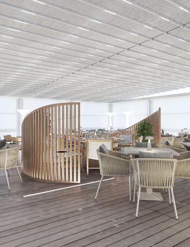 a dining room with chairs and a table and a ceiling at Porto Platanias Beach Luxury Selection - Adults Only in Plataniás