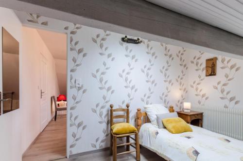 Postel nebo postele na pokoji v ubytování La rose d'henri